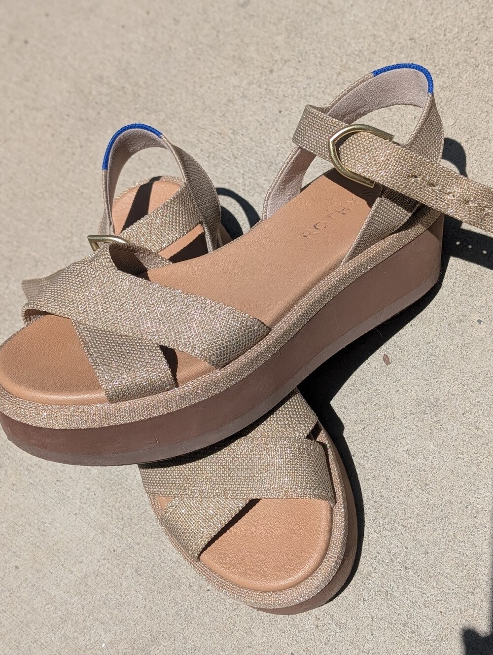 Rothy's The Criss-Cross Lightweight Wedge sandals in the color Aurora